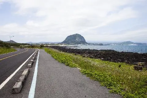 Feel the Breeze From the Sea <Cycling Jeju: A Two-Wheeled Journey Along Dazzling Coastline>